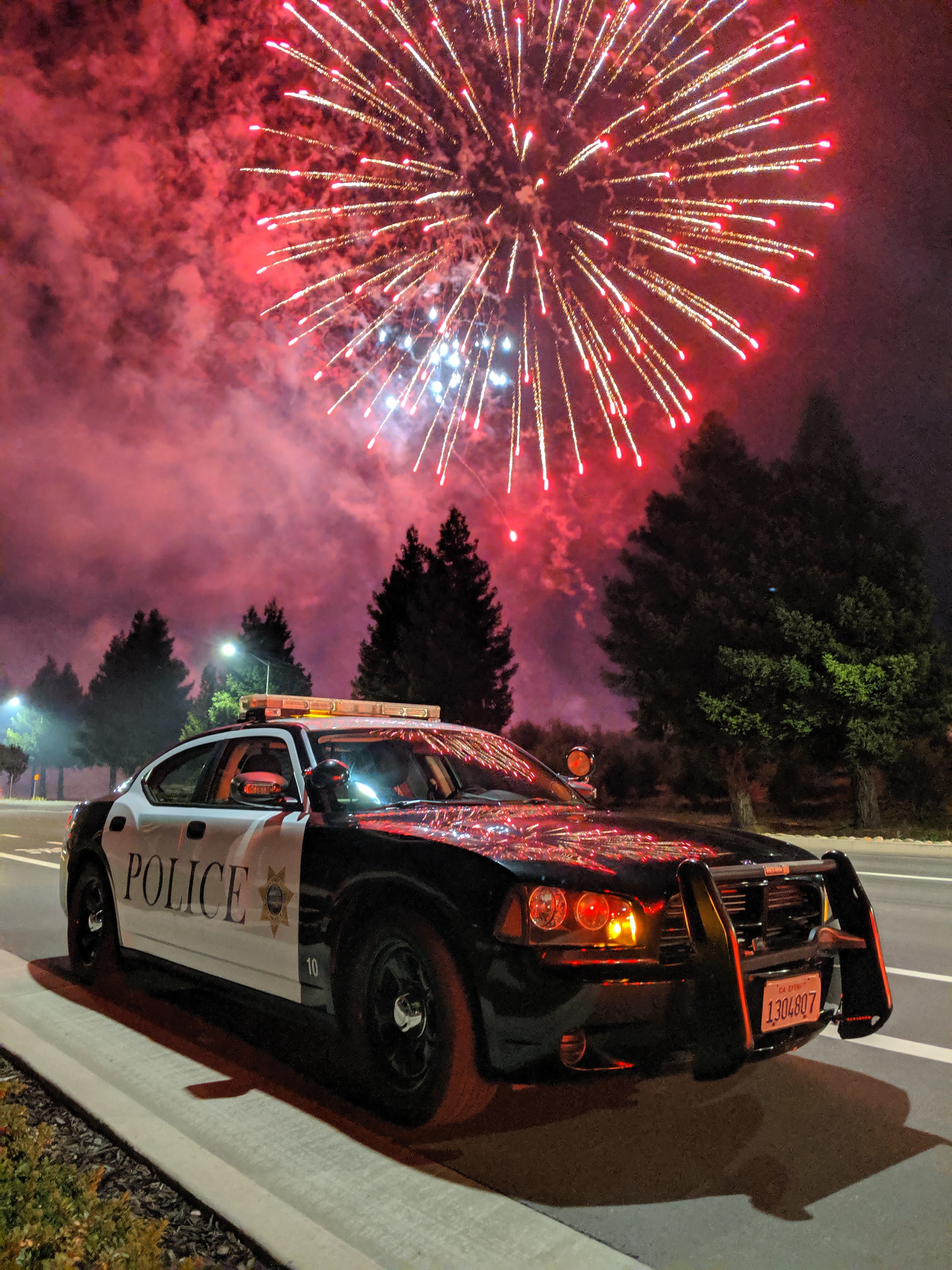 firework over police car