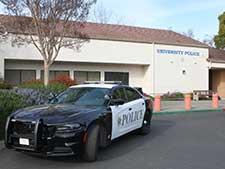 Police Car in front of University Police building